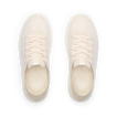 Pair of cream lace-up sneakers viewed from above, both facing upward with toes away and heels toward the viewer