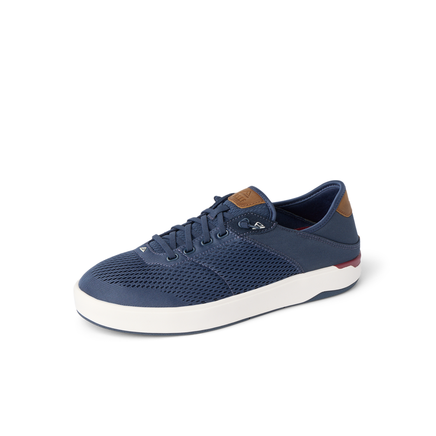 Laguna shoe facing left, navy blue breathable upper with white sole, men’s & women’s comfort sneaker for beach lifestyle.
