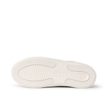 Lay Day Lite sneaker outsole facing left, showing textured tread and cushioned sole for everyday comfort