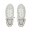 Pair of white REEF lace up sneakers facing upward, viewed from above