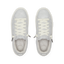 Pair of white REEF lace up sneakers facing upward, viewed from above