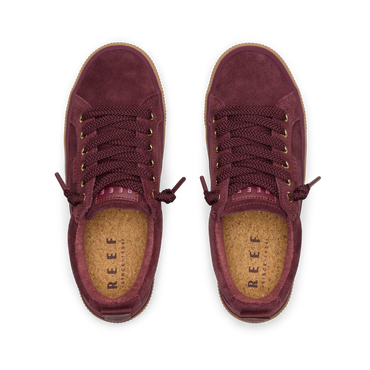 Top view of Lay Day Dawn burgundy suede sneakers for men and women by REEF, featuring cork insoles and durable comfort.
