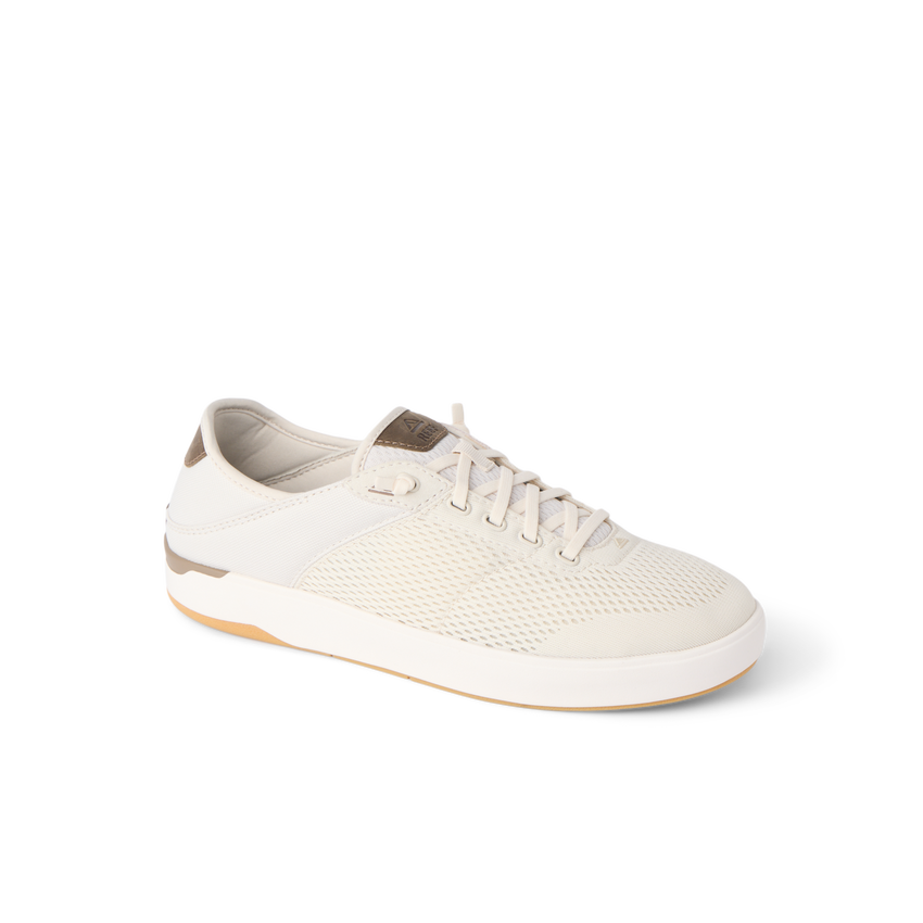 Right-facing beige sneaker with mesh upper and cushioned sole designed for comfort and durability.