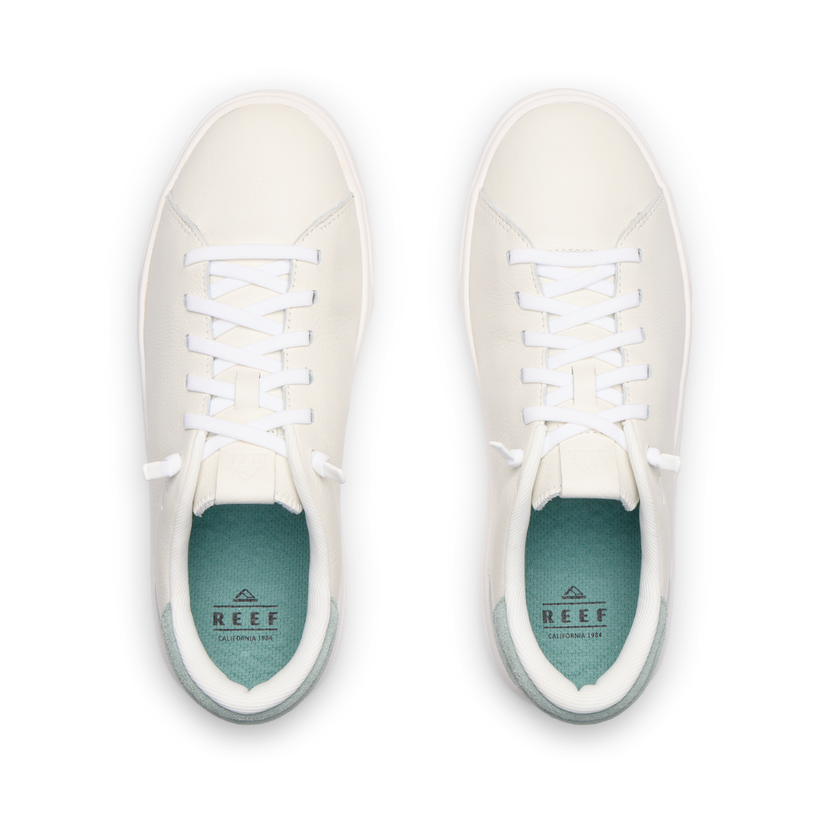 Del Mar Commuter white shoes facing upward, shown from above with cushioned footbeds and arch support