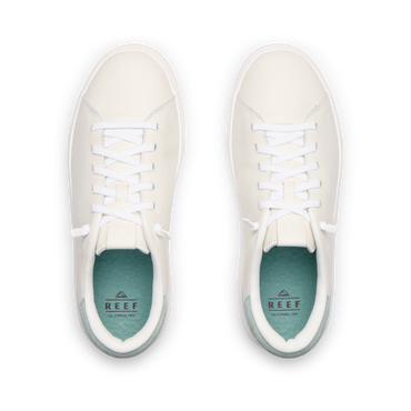 Del Mar Commuter white shoes facing upward, shown from above with cushioned footbeds and arch support