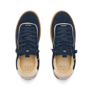 REEF Kickback sneakers viewed from above with toes facing upward and cushioned footbeds visible