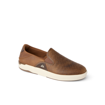 REEF Laguna Slip On brown slip on shoe facing right with textured upper and cushioned comfort