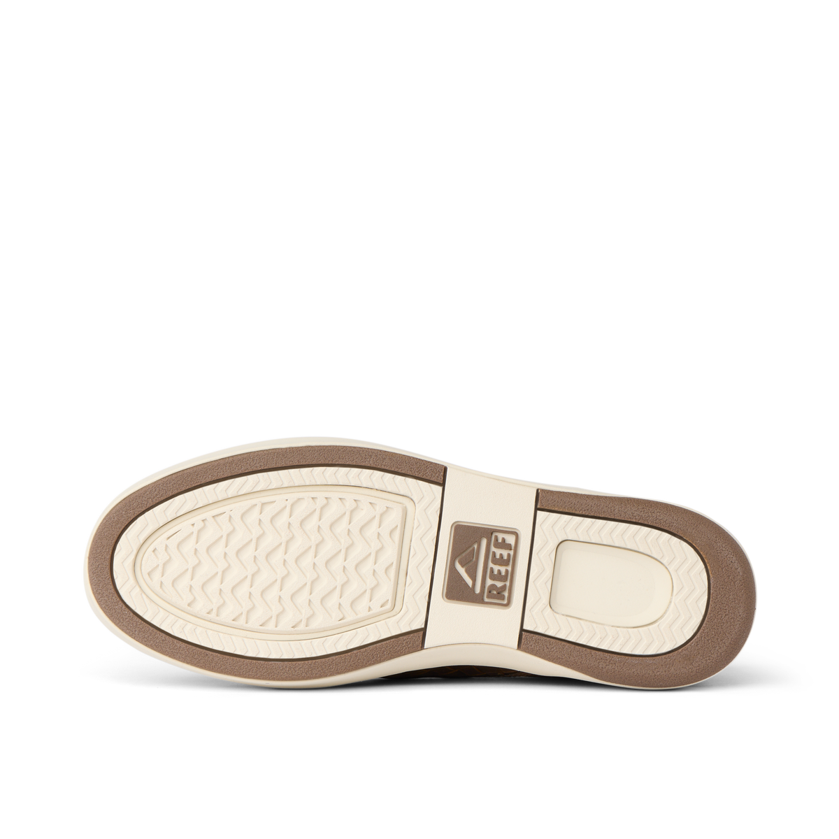 Laguna Slip On outsole facing left, showing textured tread and REEF branding for durable everyday comfort