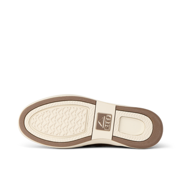 Laguna Slip On outsole facing left, showing textured tread and REEF branding for durable everyday comfort