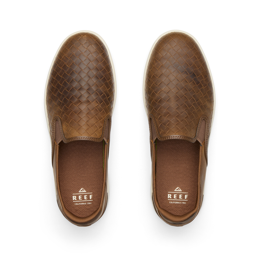 REEF Laguna Slip On shoes viewed from above, toes facing upward, showing woven brown uppers and cushioned footbeds