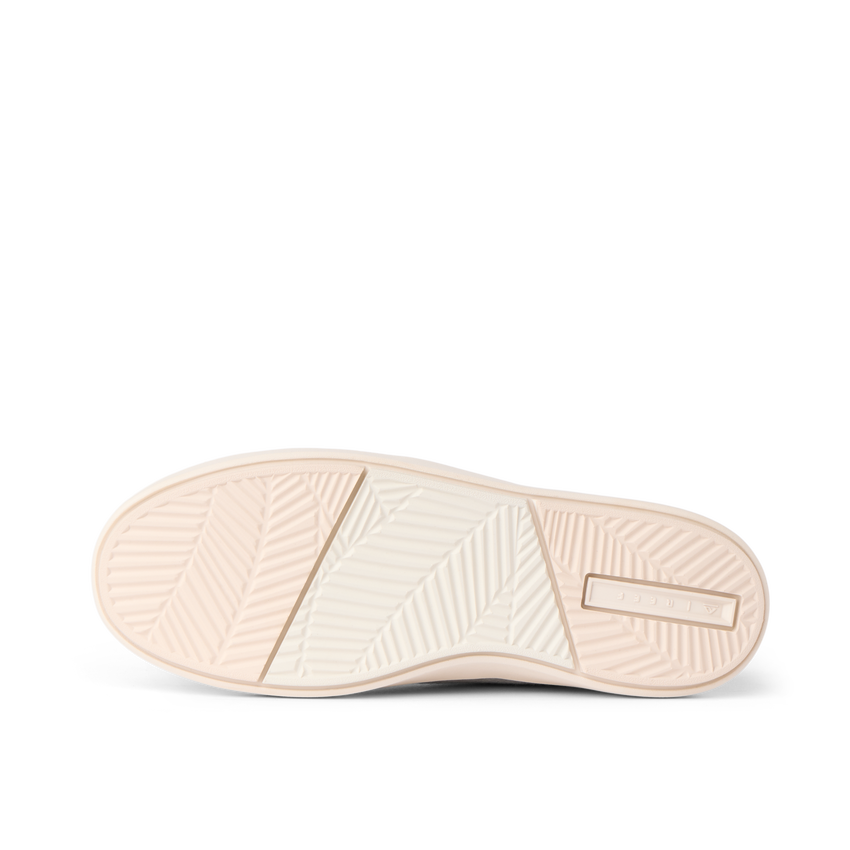 REEF Neptune 2 sneaker outsole facing left, showing textured tread and cushioned sole for everyday comfort
