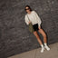 Reef Del Mar white sneakers with toes facing forward, offering lightweight comfort for everyday walking
