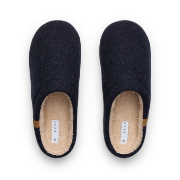 Eventide Slipper black pair facing upward with soft fleece lining and comfortable footbeds