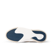 Del Mar Slip On close-up, outsole facing left with blue traction tread and supportive molded footbed