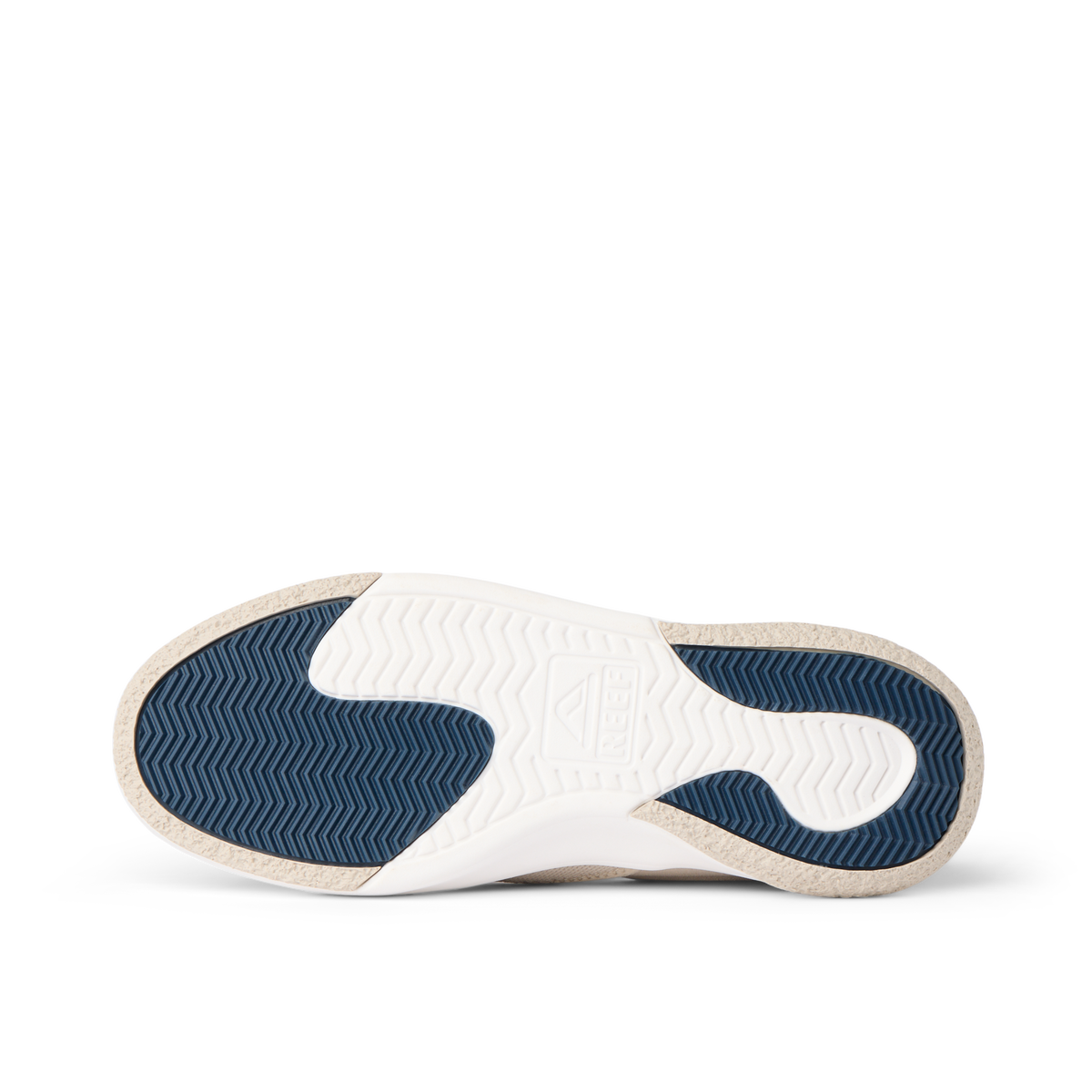 Del Mar Slip On close-up, outsole facing left with blue traction tread and supportive molded footbed