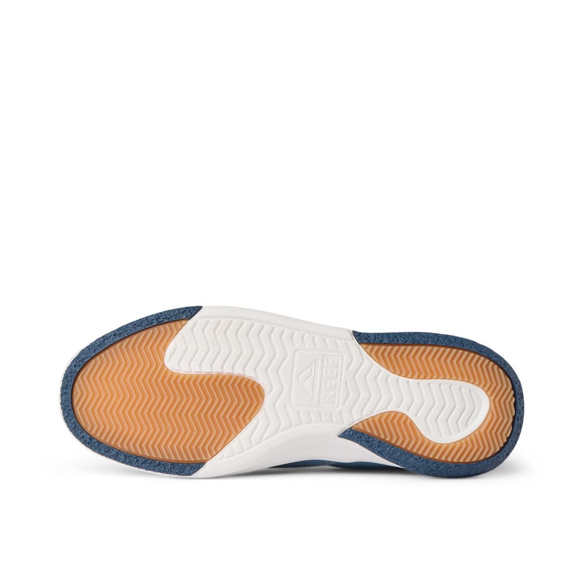 Del Mar Slip On close-up from below, toe facing left, showing orange traction tread and white cushioned sole