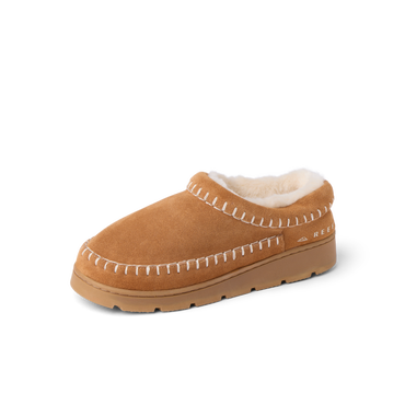 Noa Slipper facing left with tan suede, plush lining, whipstitch detailing, and cushioned sole for everyday comfort