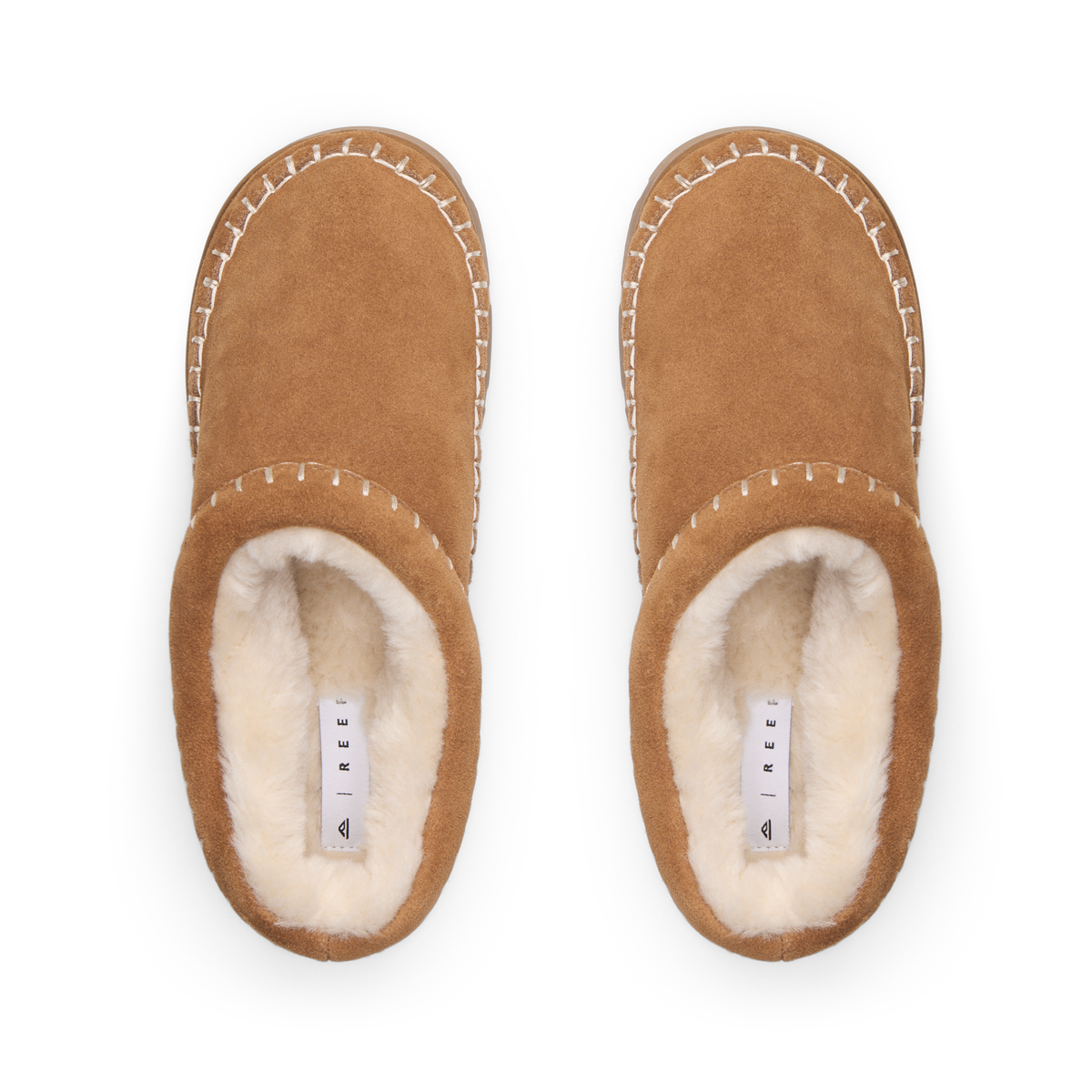 Noa Slipper suede lounge boots facing upward with plush lining and whipstitch detail