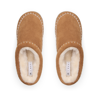 Noa Slipper suede lounge boots facing upward with plush lining and whipstitch detail