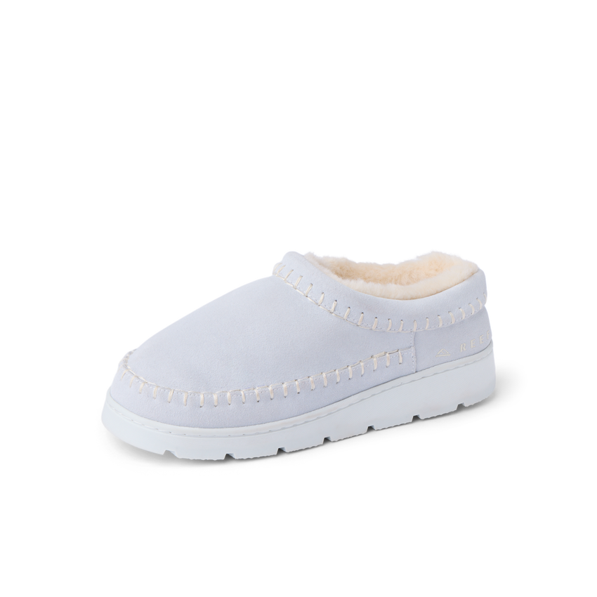 Noa Slipper white suede lounge boot facing left in side view with whipstitch detailing and cozy lining