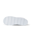 Noa Slipper outsole close up facing right with textured white tread and deep traction grooves