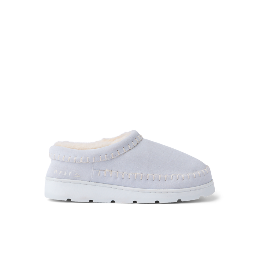 Noa Slipper white suede lounge boot facing right with whipstitch detailing and cushioned sole