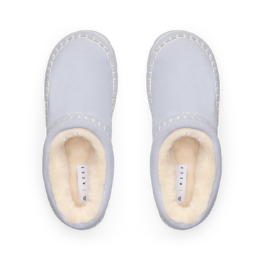 Noa Slipper lounge boots facing upward with plush lining and whipstitch suede detailing