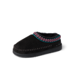 Indie Slipper black slipper facing left with cushioned footbed and patterned trim for everyday comfort