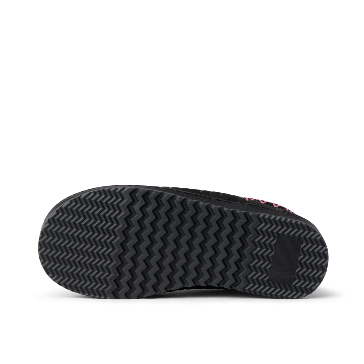 Indie Slipper close up showing the textured bottom sole facing the viewer for traction