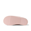 Indie Slipper outsole close up, toe facing left, textured tread for comfortable beach wear