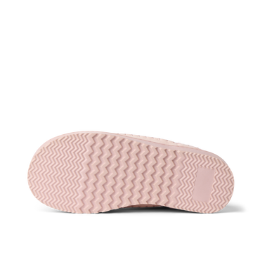 Indie Slipper outsole close up, toe facing left, textured tread for comfortable beach wear