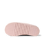 Indie Slipper outsole close up, toe facing left, textured tread for comfortable beach wear