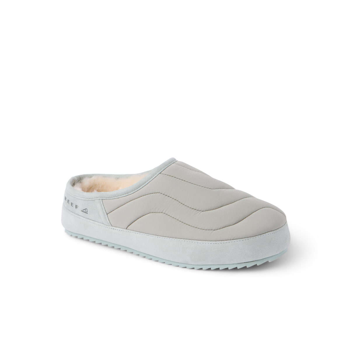 Willa Slipper facing right, showing its quilted upper, plush faux fur lining, and cushioned sole