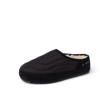 Willa Slipper facing left with a quilted black upper and plush faux fur lining