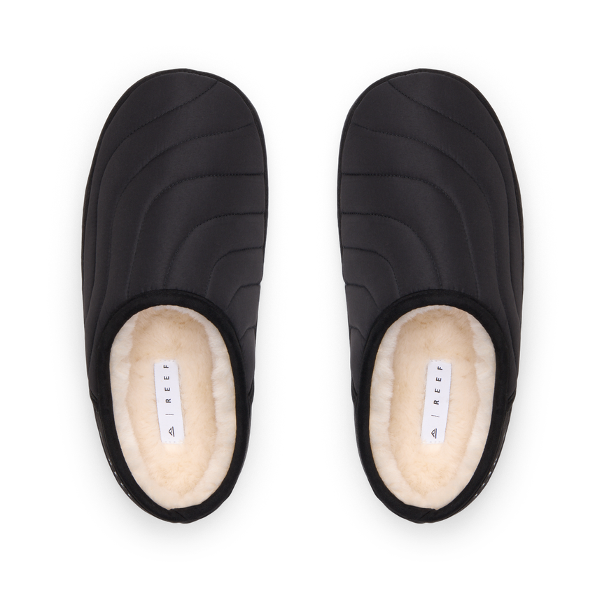 Willa Slipper black quilted pair facing upward with plush faux fur lining and cushioned comfort