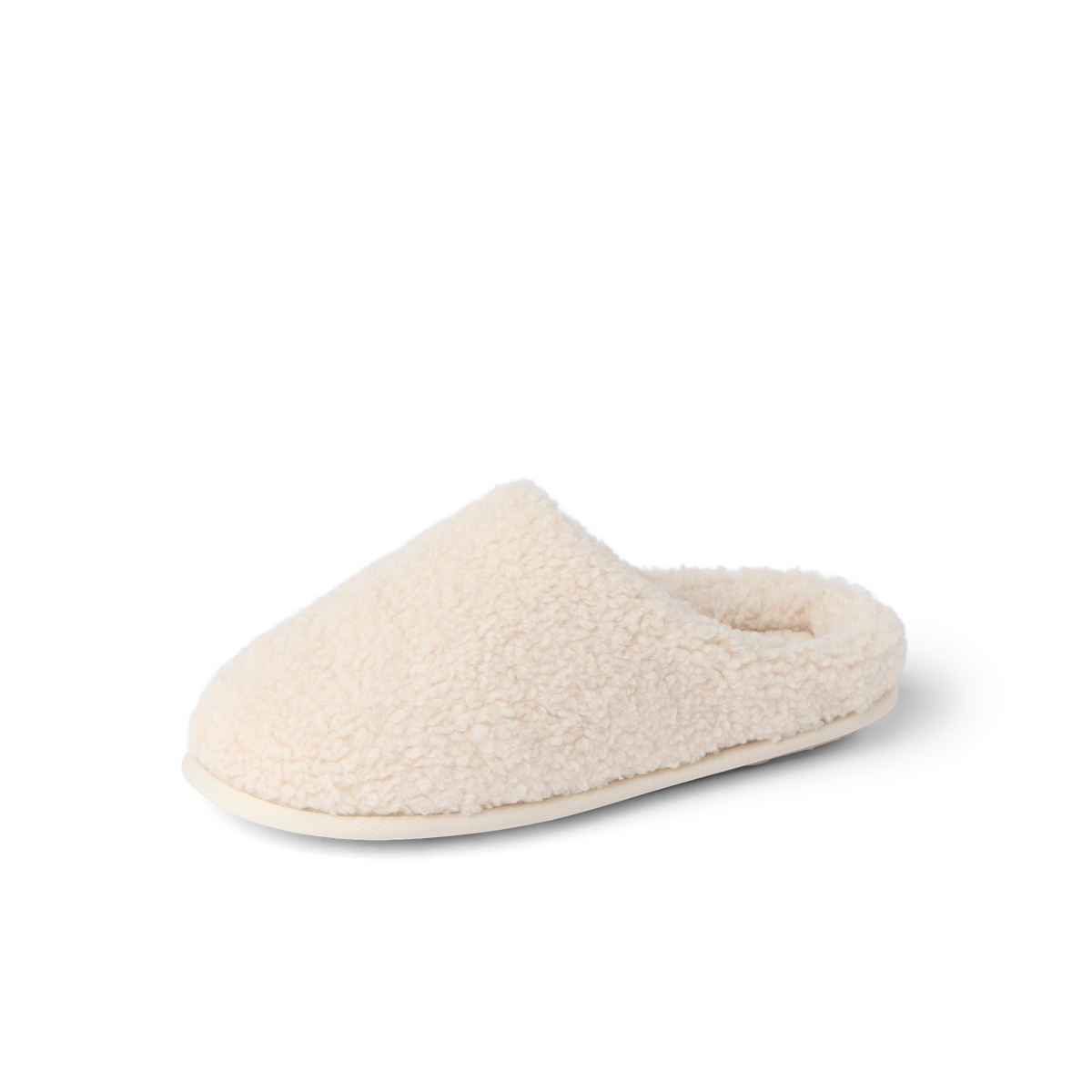 Daydream Slipper in cream faux shearling, toe facing left, showing the full cozy mule shape