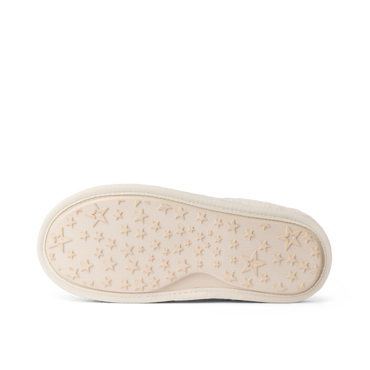 Daydream Slipper outsole facing upward with the toe pointing right and star patterned tread visible