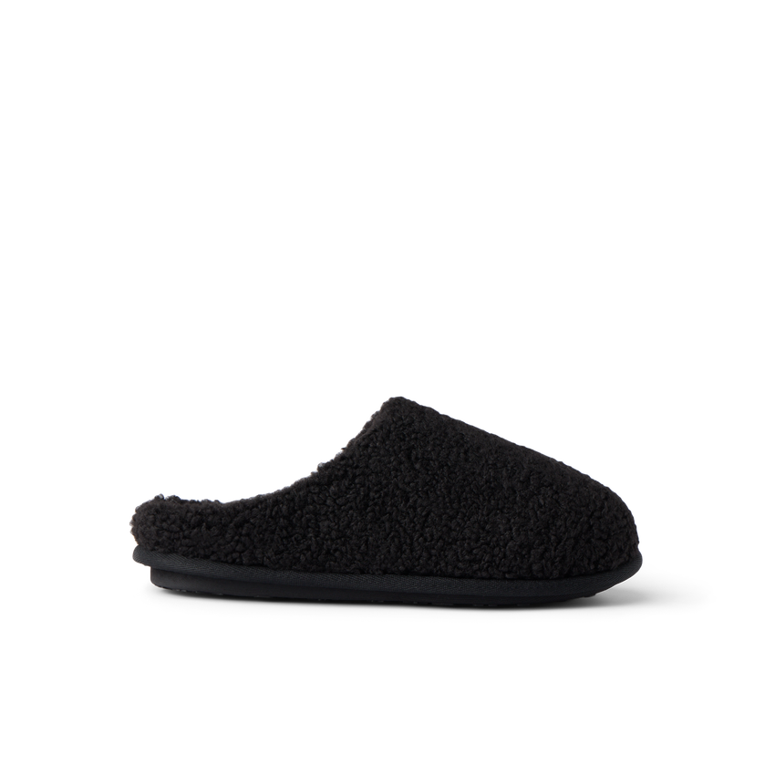 Daydream Slipper black faux shearling mule facing right for cozy everyday comfort