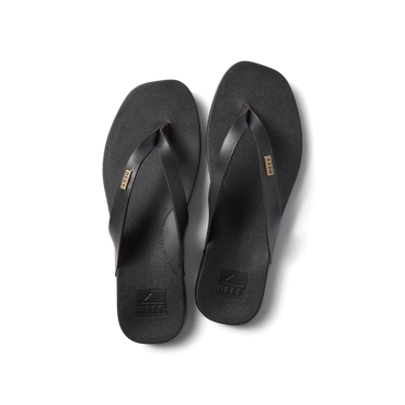 Vista Lune black flip flops top view, showing front straps with anatomical arch support, water-friendly comfort design.