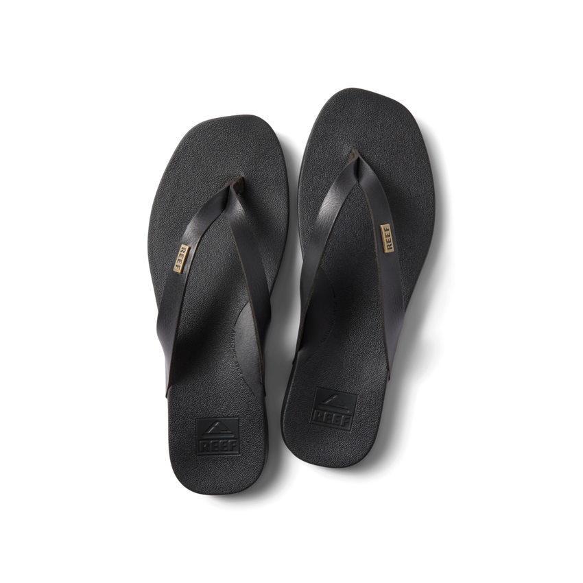 Vista Lune black flip flops top view, showing front straps with anatomical arch support, water-friendly comfort design.