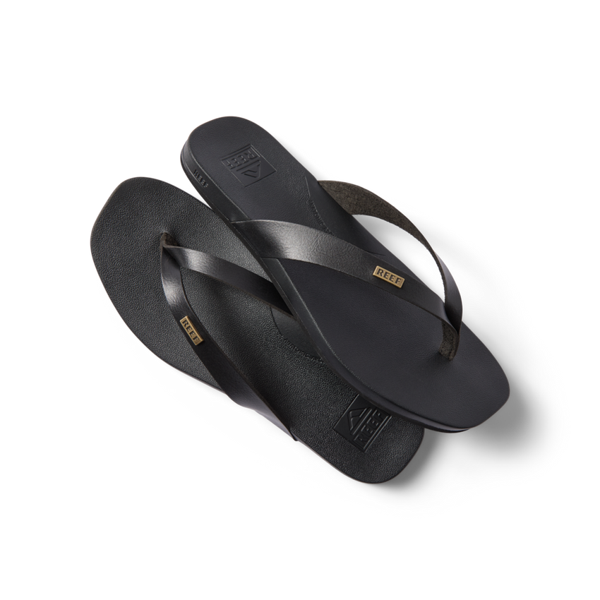 Vista Lune women’s black flip flops facing right, showing top and bottom with soft-rebound cushioning and arch support