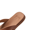 Close-up of the front right side of the tan Vista Lune sandal showing soft-rebound cushioning and anatomical arch support.