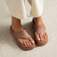 Cali Laguna brown platform sandals facing forward in a close up showing full cushioned sandals and arch support