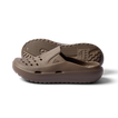 Pair of brown Glider slides facing left showing side profile and sole with water-friendly perforations and arch support.