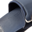 Fanning + Slide close-up of navy blue footbed and strap showing anatomical contour and soft-rebound cushioning features