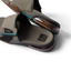 Close-up of tan slides facing right showing textured footbed, REEF logo, and transparent cushioned sole with REEFLEX foam support.