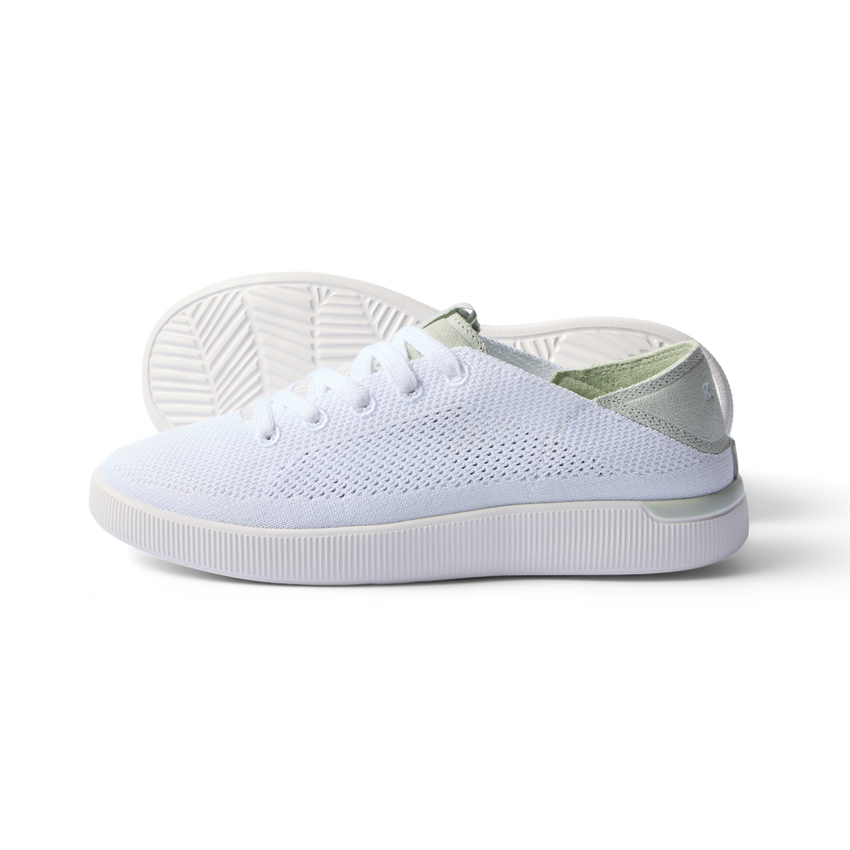 Reef Neptune women's white and dusty sage sneaker facing right, breathable knit upper, cushioned sole, beach-inspired comfort.