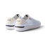 Reef Neptune white and black women's sneaker facing back right, featuring anatomical arch support and soft cushioning.