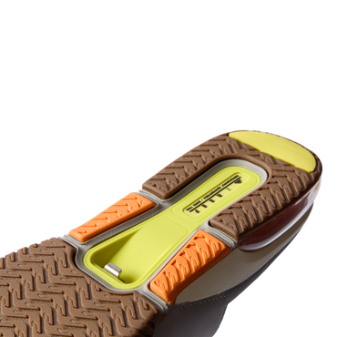 Close-up of the sole front facing of the Fanning + Slide showing durable traction with water-friendly materials and arch support.