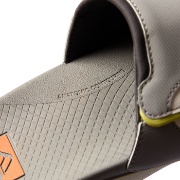 Close-up of the footbed and strap of the grey Fanning + Slide facing left, showcasing anatomical arch support and cushioning.